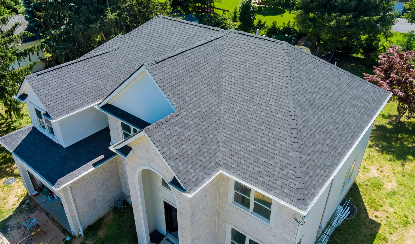 After roofing project showing new architectural shingle roof installation in Dallas, TX